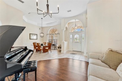 Welcome to 68 Egret Trail - A Golf Course Pool Home in the Heart on The Grand Club Cypress Course in Florida - for sale on GolfHomes.com, golf home, golf lot