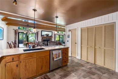 A Tuscan-style upper-level unit featuring a primary suite on the on Keowee Key Golf and Country Club in South Carolina - for sale on GolfHomes.com, golf home, golf lot