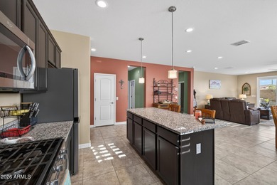 Located on a premium homesite with no backyard neighbors, this on Poston Butte Golf Club in Arizona - for sale on GolfHomes.com, golf home, golf lot