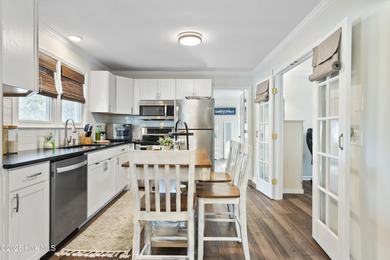 Located on the highly desirable south side of E. Oak Island on Oak Island Golf Club in North Carolina - for sale on GolfHomes.com, golf home, golf lot