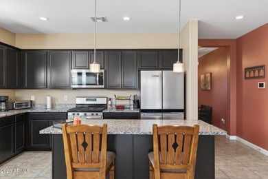 Located on a premium homesite with no backyard neighbors, this on Poston Butte Golf Club in Arizona - for sale on GolfHomes.com, golf home, golf lot