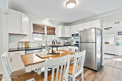 Located on the highly desirable south side of E. Oak Island on Oak Island Golf Club in North Carolina - for sale on GolfHomes.com, golf home, golf lot