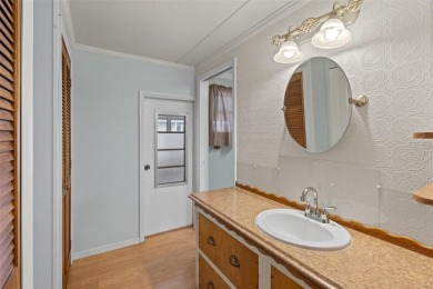 Lovely 2 Bedroom, 2 Bathroom mobile home in High Point, a on High Point Golf Club, Inc. in Florida - for sale on GolfHomes.com, golf home, golf lot