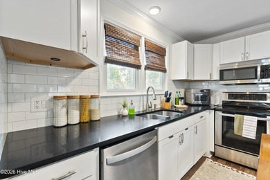 Located on the highly desirable south side of E. Oak Island on Oak Island Golf Club in North Carolina - for sale on GolfHomes.com, golf home, golf lot