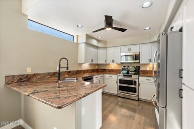 EMBRACE RESORT-STYLE LIVING IN GATED GAINEY RANCH JUST STEPS on Gainey Ranch Golf Club in Arizona - for sale on GolfHomes.com, golf home, golf lot