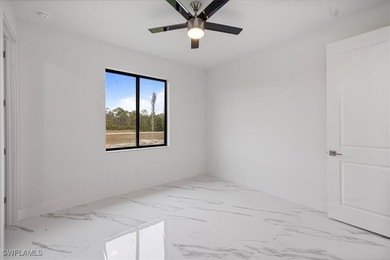 Metal Roof with a lifespam of 50+years. This house has 2 Master on Burnt Store Golf Club in Florida - for sale on GolfHomes.com, golf home, golf lot