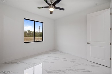 Metal Roof with a lifespam of 50+years. This house has 2 Master on Burnt Store Golf Club in Florida - for sale on GolfHomes.com, golf home, golf lot