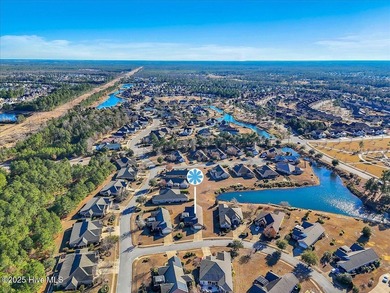 Don't miss out on this move-in ready Florida style home with on Cape Fear National At Brunswick Forest in North Carolina - for sale on GolfHomes.com, golf home, golf lot