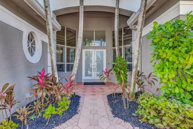 Discover unparalleled elegance in this stunning 3-bedroom on PGA National Estates Golf Course in Florida - for sale on GolfHomes.com, golf home, golf lot