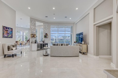 Discover unparalleled elegance in this stunning 3-bedroom on PGA National Estates Golf Course in Florida - for sale on GolfHomes.com, golf home, golf lot