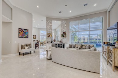 Discover unparalleled elegance in this stunning 3-bedroom on PGA National Estates Golf Course in Florida - for sale on GolfHomes.com, golf home, golf lot