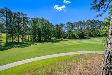 A Tuscan-style upper-level unit featuring a primary suite on the on Keowee Key Golf and Country Club in South Carolina - for sale on GolfHomes.com, golf home, golf lot