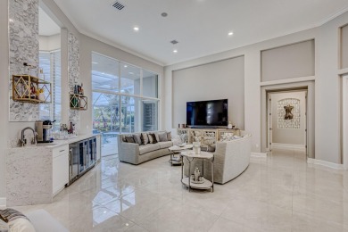 Discover unparalleled elegance in this stunning 3-bedroom on PGA National Estates Golf Course in Florida - for sale on GolfHomes.com, golf home, golf lot