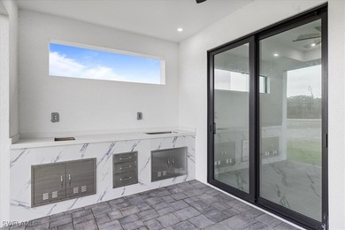 Metal Roof with a lifespam of 50+years. This house has 2 Master on Burnt Store Golf Club in Florida - for sale on GolfHomes.com, golf home, golf lot