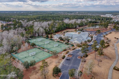 Don't miss out on this move-in ready Florida style home with on Cape Fear National At Brunswick Forest in North Carolina - for sale on GolfHomes.com, golf home, golf lot