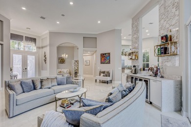 Discover unparalleled elegance in this stunning 3-bedroom on PGA National Estates Golf Course in Florida - for sale on GolfHomes.com, golf home, golf lot