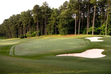 A Tuscan-style upper-level unit featuring a primary suite on the on Keowee Key Golf and Country Club in South Carolina - for sale on GolfHomes.com, golf home, golf lot