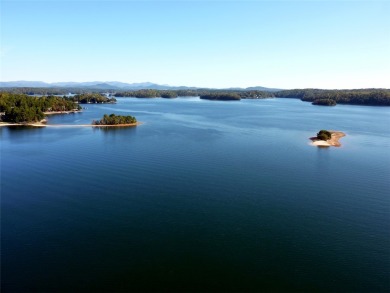 A Tuscan-style upper-level unit featuring a primary suite on the on Keowee Key Golf and Country Club in South Carolina - for sale on GolfHomes.com, golf home, golf lot