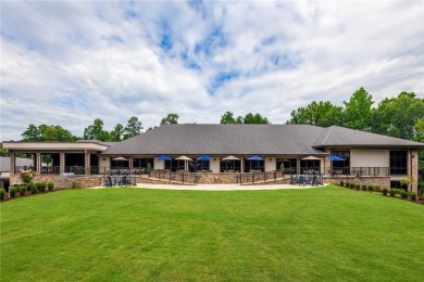 A Tuscan-style upper-level unit featuring a primary suite on the on Keowee Key Golf and Country Club in South Carolina - for sale on GolfHomes.com, golf home, golf lot