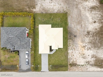 Metal Roof with a lifespam of 50+years. This house has 2 Master on Burnt Store Golf Club in Florida - for sale on GolfHomes.com, golf home, golf lot