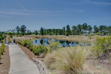 Don't miss out on this move-in ready Florida style home with on Cape Fear National At Brunswick Forest in North Carolina - for sale on GolfHomes.com, golf home, golf lot