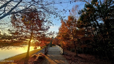 Don't miss out on this move-in ready Florida style home with on Cape Fear National At Brunswick Forest in North Carolina - for sale on GolfHomes.com, golf home, golf lot