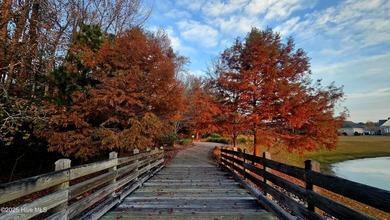 Don't miss out on this move-in ready Florida style home with on Cape Fear National At Brunswick Forest in North Carolina - for sale on GolfHomes.com, golf home, golf lot