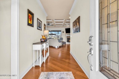 Experience the pinnacle of coastal living in this custom-built on Magnolia Greens Golf Plantation in North Carolina - for sale on GolfHomes.com, golf home, golf lot