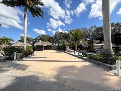 An oversized 3,334 sq ft lot offering refined resort-style on St. Lucie Trail Golf Club in Florida - for sale on GolfHomes.com, golf home, golf lot