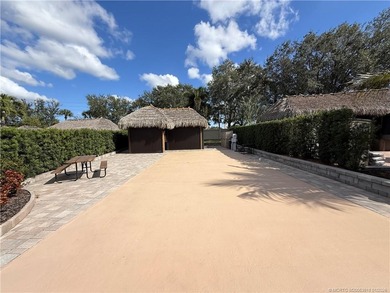 An oversized 3,334 sq ft lot offering refined resort-style on St. Lucie Trail Golf Club in Florida - for sale on GolfHomes.com, golf home, golf lot