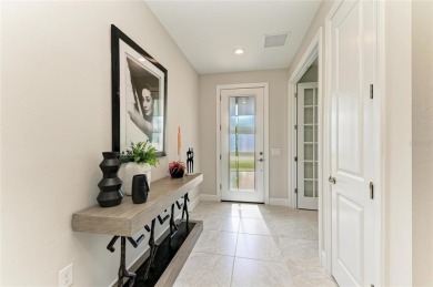 Nestled in the heart of Del Webb at Lakewood Ranch. A premier on The Concession Golf Club in Florida - for sale on GolfHomes.com, golf home, golf lot