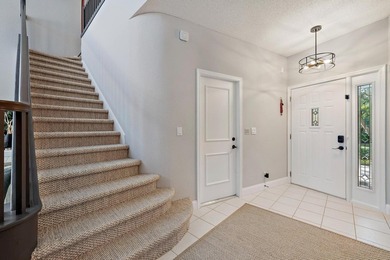 Exquisitely transformed residence in the Spanish-inspired on PGA National Golf Club in Florida - for sale on GolfHomes.com, golf home, golf lot