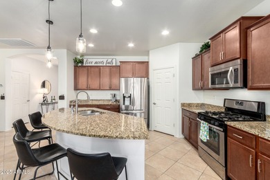 LIVE THE GOOD LIFE IN SUN CITY! Welcome to this delightful home on Poston Butte Golf Club in Arizona - for sale on GolfHomes.com, golf home, golf lot