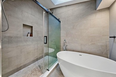 Exquisitely transformed residence in the Spanish-inspired on PGA National Golf Club in Florida - for sale on GolfHomes.com, golf home, golf lot