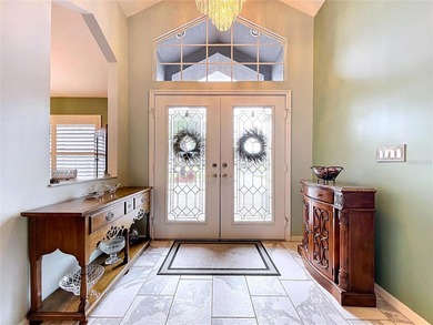 Discover this beautifully maintained 3-bedroom, 2-bath pool home on Glen Lakes Country Club in Florida - for sale on GolfHomes.com, golf home, golf lot