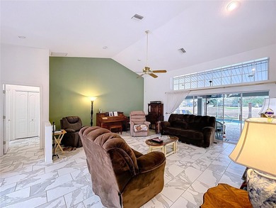 Discover this beautifully maintained 3-bedroom, 2-bath pool home on Glen Lakes Country Club in Florida - for sale on GolfHomes.com, golf home, golf lot