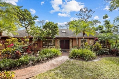 Discover a rare, tropical, secret garden within the gated on Martin Downs Country Club in Florida - for sale on GolfHomes.com, golf home, golf lot