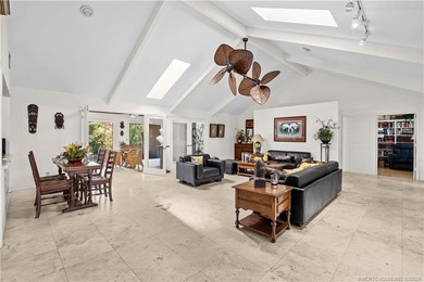 Discover a rare, tropical, secret garden within the gated on Martin Downs Country Club in Florida - for sale on GolfHomes.com, golf home, golf lot