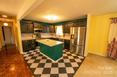 Beautiful 5 bedroom, 2.5 bathroom home nestled off the 17th hole on Lake Junaluska Golf Course in North Carolina - for sale on GolfHomes.com, golf home, golf lot