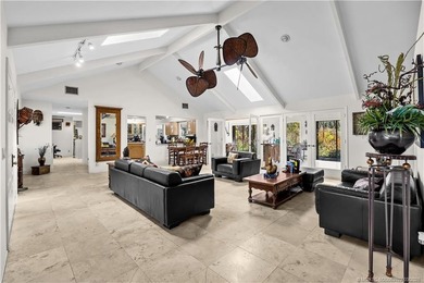 Discover a rare, tropical, secret garden within the gated on Martin Downs Country Club in Florida - for sale on GolfHomes.com, golf home, golf lot