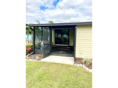 Discover this charming two-bedroom, two-bathroom home in the on Pine Lakes Country Club in Florida - for sale on GolfHomes.com, golf home, golf lot