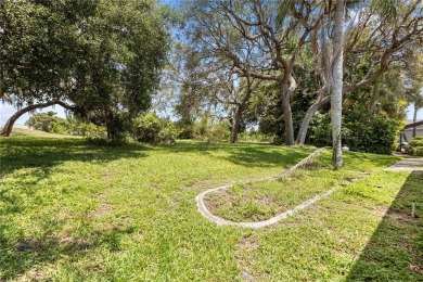 Welcome to this beautifully maintained 3-bedroom, 2.5-bathroom on The Links Golf Course in Florida - for sale on GolfHomes.com, golf home, golf lot