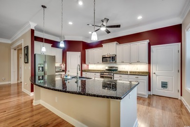 This beautifully landscaped home is a nature lovers paradise on Wachesaw Plantation East Golf Course in South Carolina - for sale on GolfHomes.com, golf home, golf lot