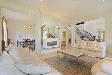Luxurious 7-Bedroom Home on the 9th Hole of Apple Mountain Golf on Golf Club At Apple Mountain in Michigan - for sale on GolfHomes.com, golf home, golf lot
