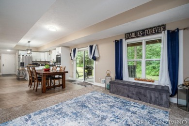 Welcome to 309 Woodview, a beautifully reimagined 4-bedroom on Eagle Island Golf Club in Michigan - for sale on GolfHomes.com, golf home, golf lot