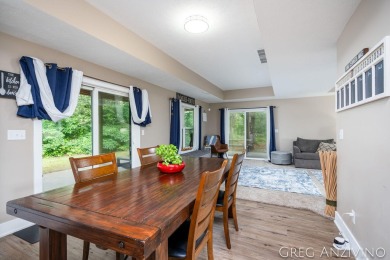 Welcome to 309 Woodview, a beautifully reimagined 4-bedroom on Eagle Island Golf Club in Michigan - for sale on GolfHomes.com, golf home, golf lot
