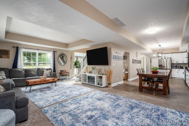 Welcome to 309 Woodview, a beautifully reimagined 4-bedroom on Eagle Island Golf Club in Michigan - for sale on GolfHomes.com, golf home, golf lot