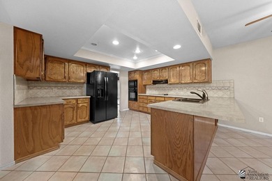 Inviting 2 bed, 2 bath townhome in Villa Coronado, perfectly on Mesa Del Sol Golf Club in Arizona - for sale on GolfHomes.com, golf home, golf lot