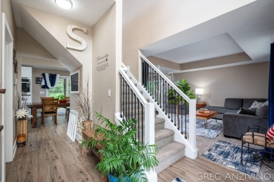 Welcome to 309 Woodview, a beautifully reimagined 4-bedroom on Eagle Island Golf Club in Michigan - for sale on GolfHomes.com, golf home, golf lot