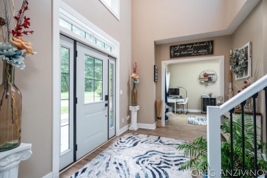Welcome to 309 Woodview, a beautifully reimagined 4-bedroom on Eagle Island Golf Club in Michigan - for sale on GolfHomes.com, golf home, golf lot